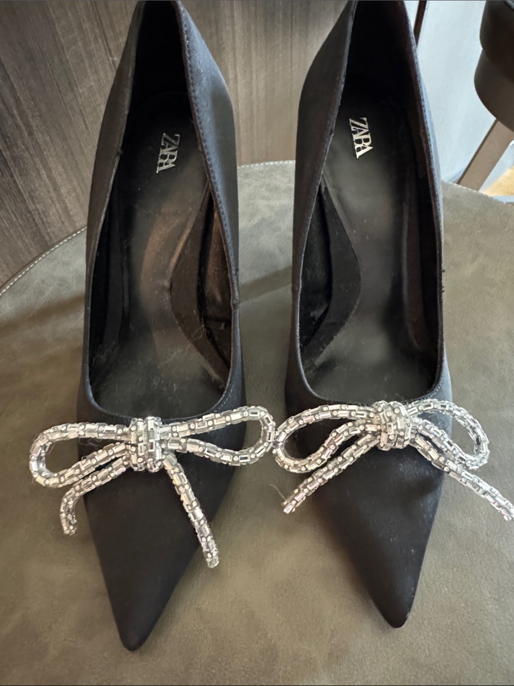 Zara Black Satin Pointed-Toe Pumps with Crystal Bow Detail